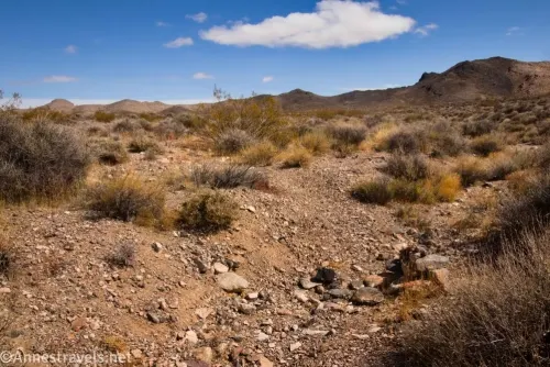 A small cairn in the desert marking where to leave the Echo Canyon Wash to follow the old road to the rim of Amargosa Valley in Death Valley National Park, California
