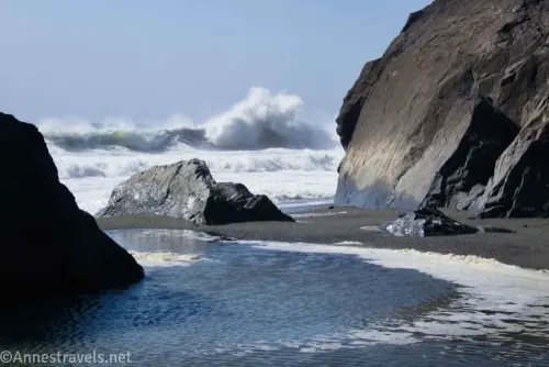 Waves crash among the sea stacks at the end of the Ossagon Trail in Prairie Creek Redwoods State Park, California