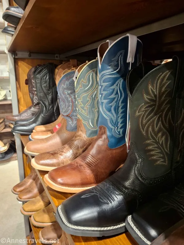 Eight cowboy boots in various colors and styles