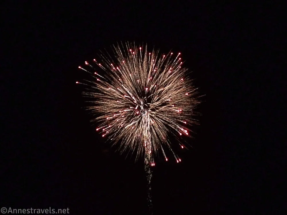 White and pink large firework explosion