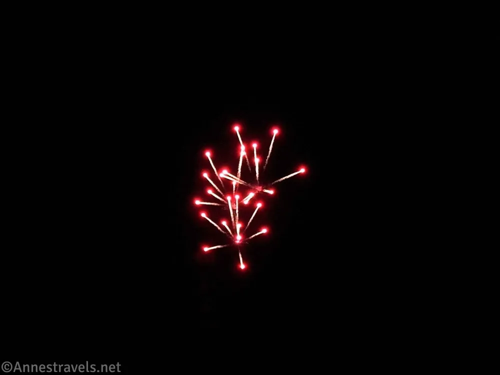 Red sparkles on the end of fireworks