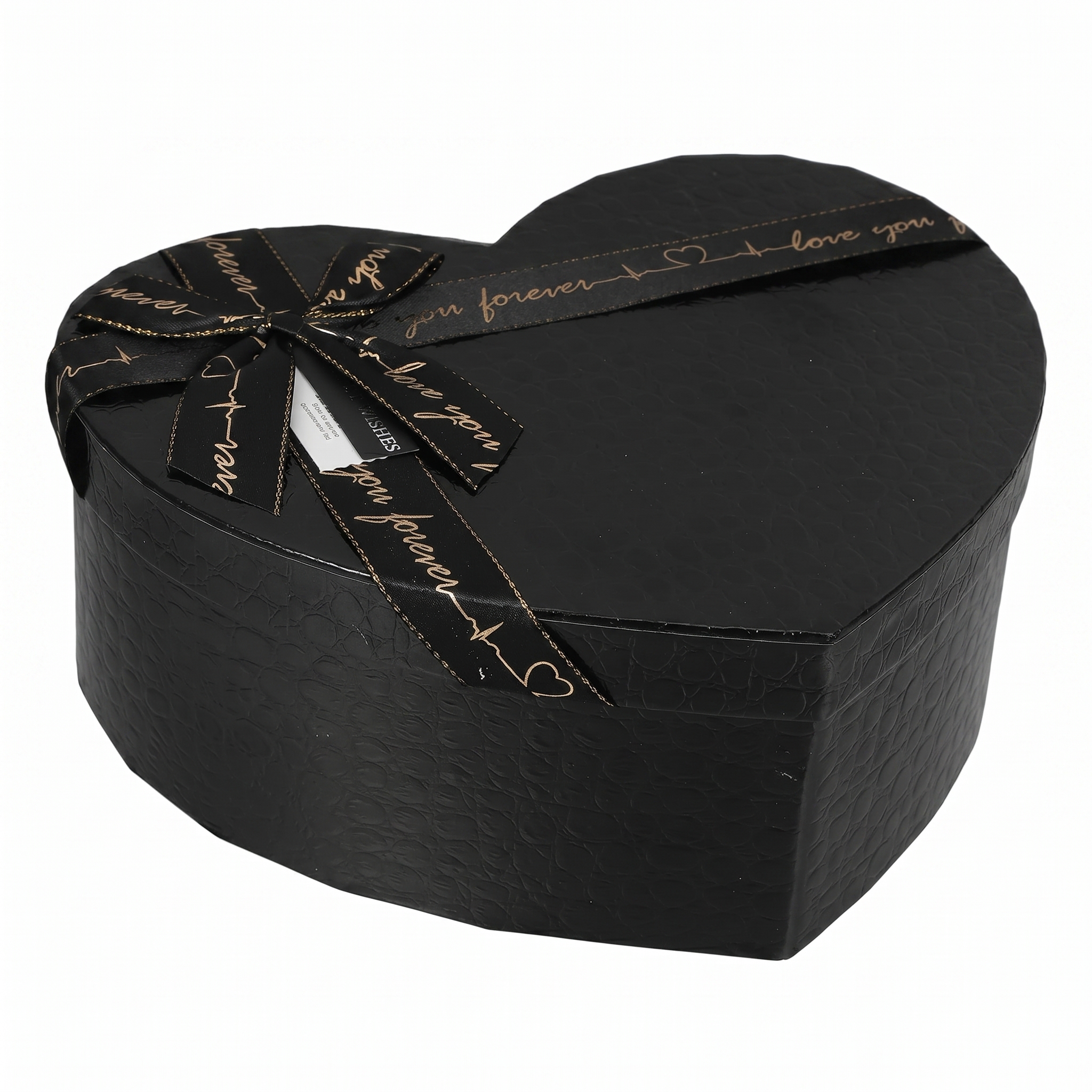 A textured black heart-shaped gift box decorated with a matching gold-scripted "love you" ribbon.