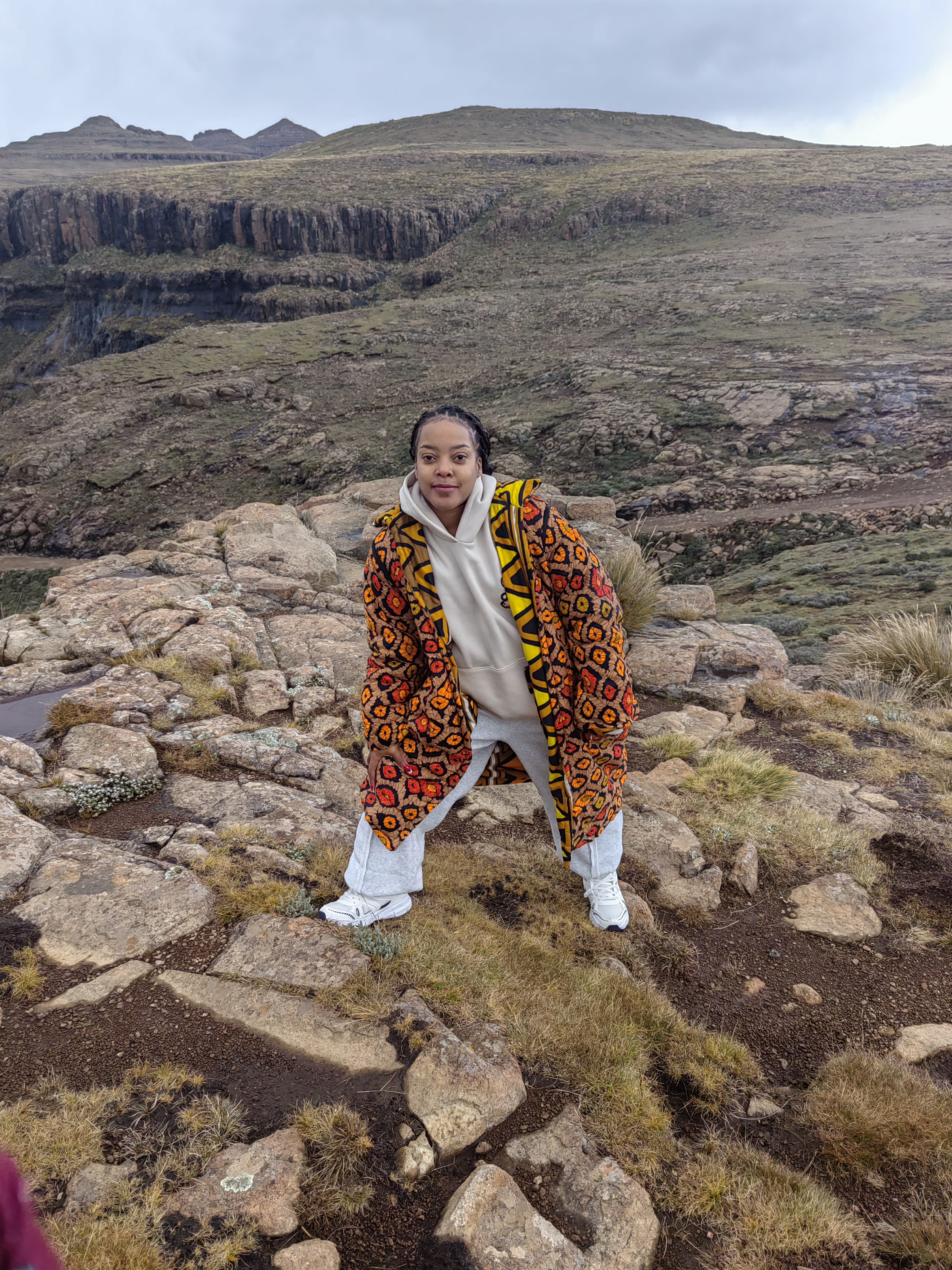 Crouched on the rocky summit