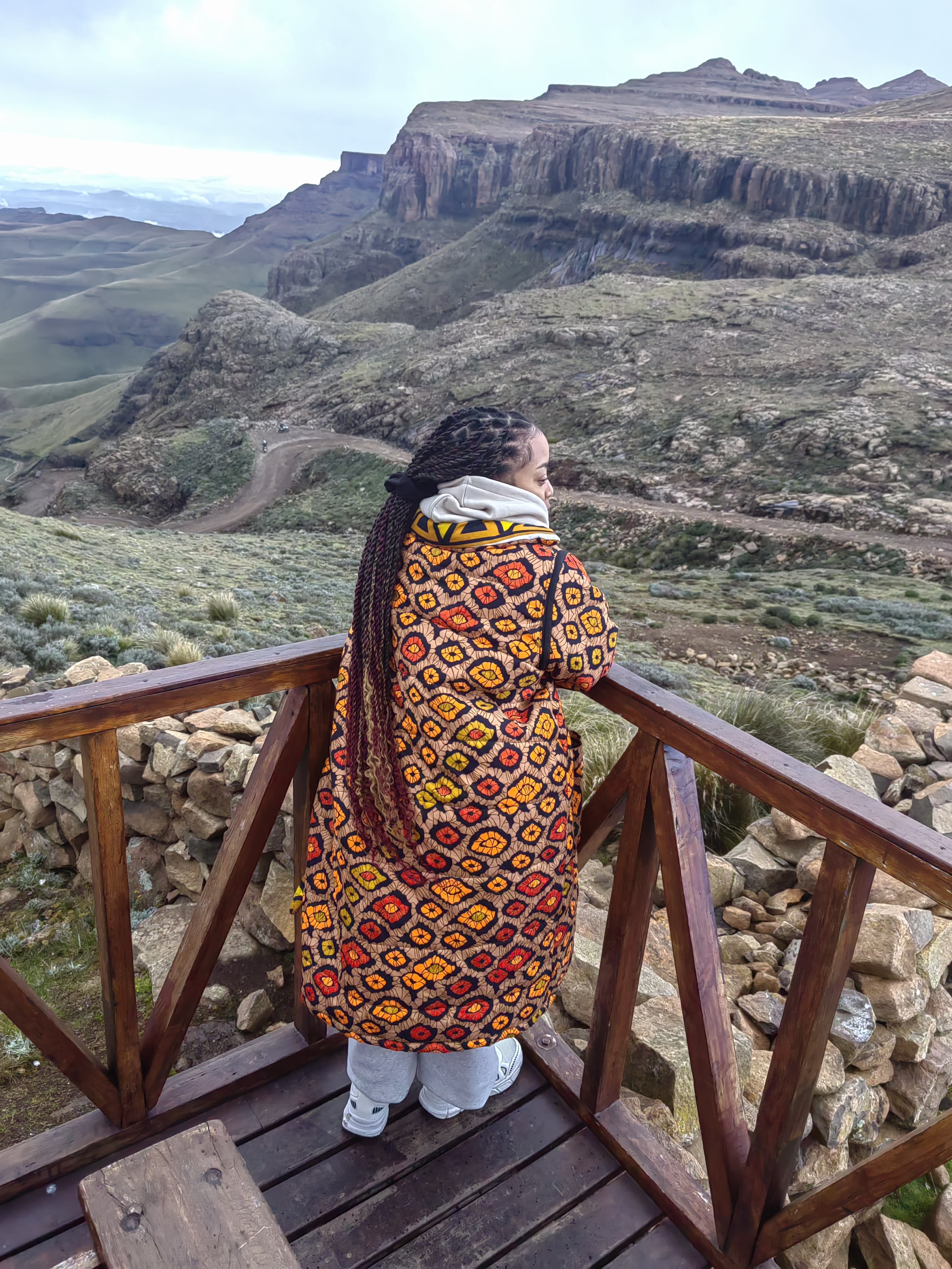 A blanket coat gazing over the highland pass