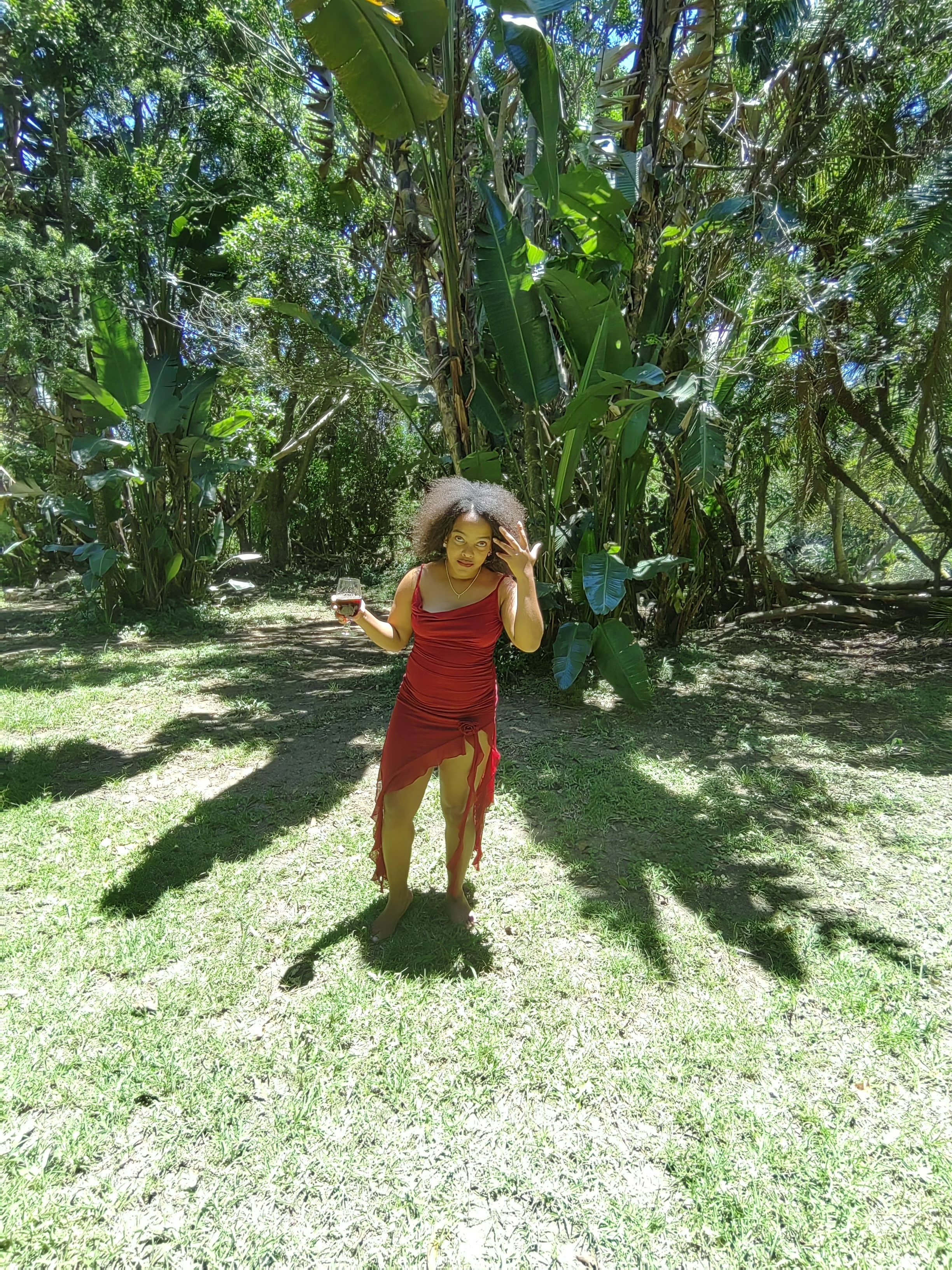 Red slip dress, animated on the lawn