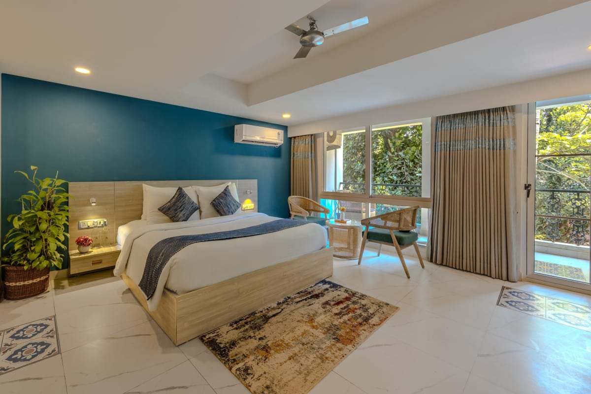 Goan Bliss Premium Room | Aesthetic Suite in a Boutique Resort with Pool, Dining, Library & Serene Tropical Setting