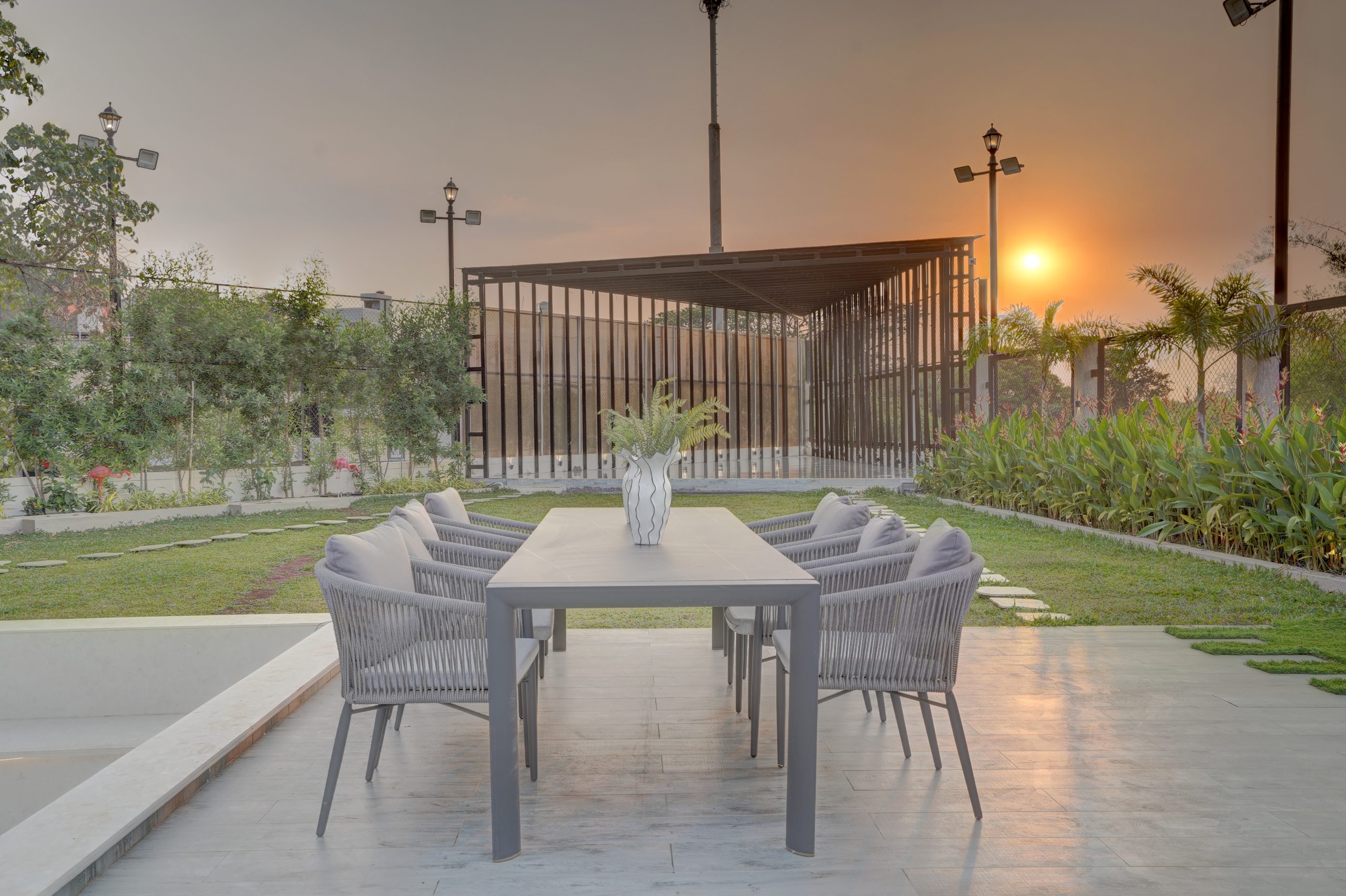 Outdoor spaces and pool at Privé Meraki Villa Lonavala