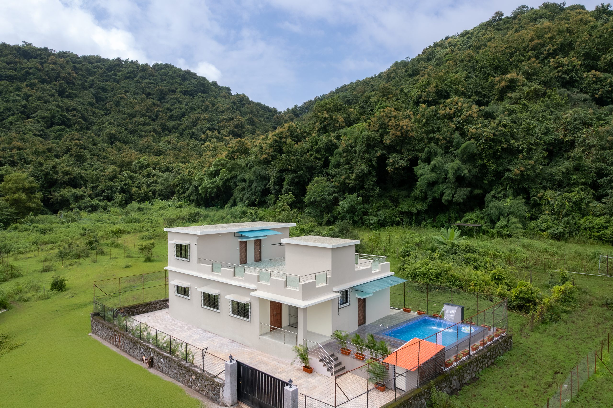 Alibaug villa bedroom and living area