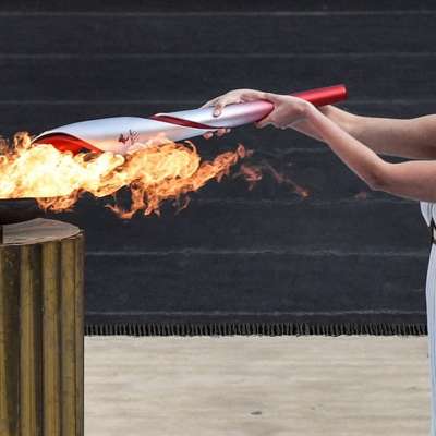 Une Liégeoise porteuse de la flamme olympique