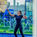 A woman playing a match of Sky Padel.