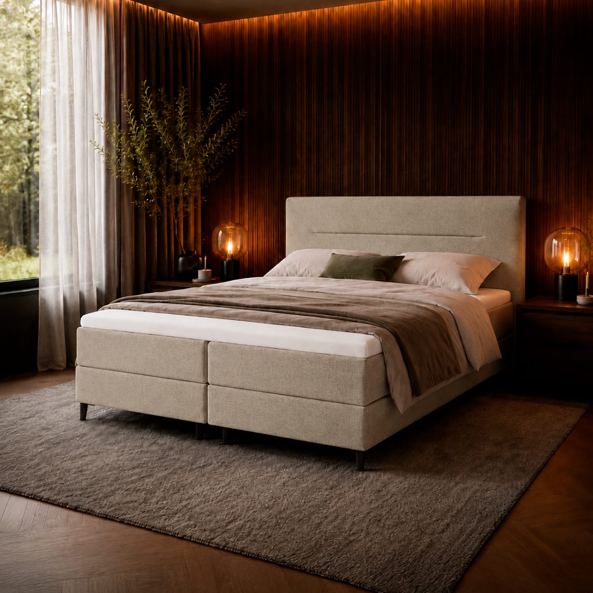 Beige Bella elevationsseng fra Dixxius med polstret sengegavl og hvidt sengetøj.