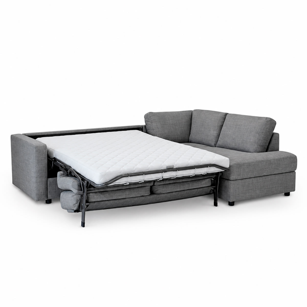 Grå hjørnesovesofa fra Fjellvig med open end, foldet ud til seng med quiltet madras.