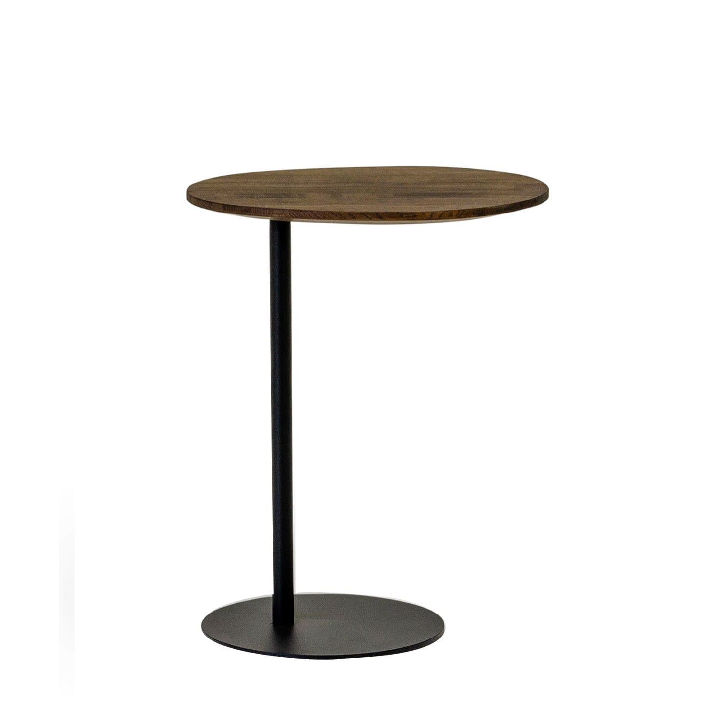 Et moderne sidebord med mørk oval træplade og sort metalfod.