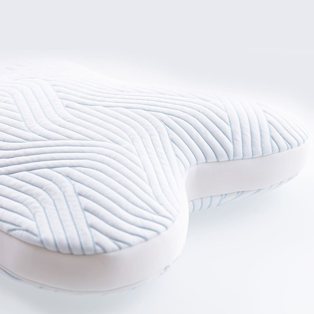 Billedet viser en Ombracio-formet TEMPUR hovedpude helt t�t p�