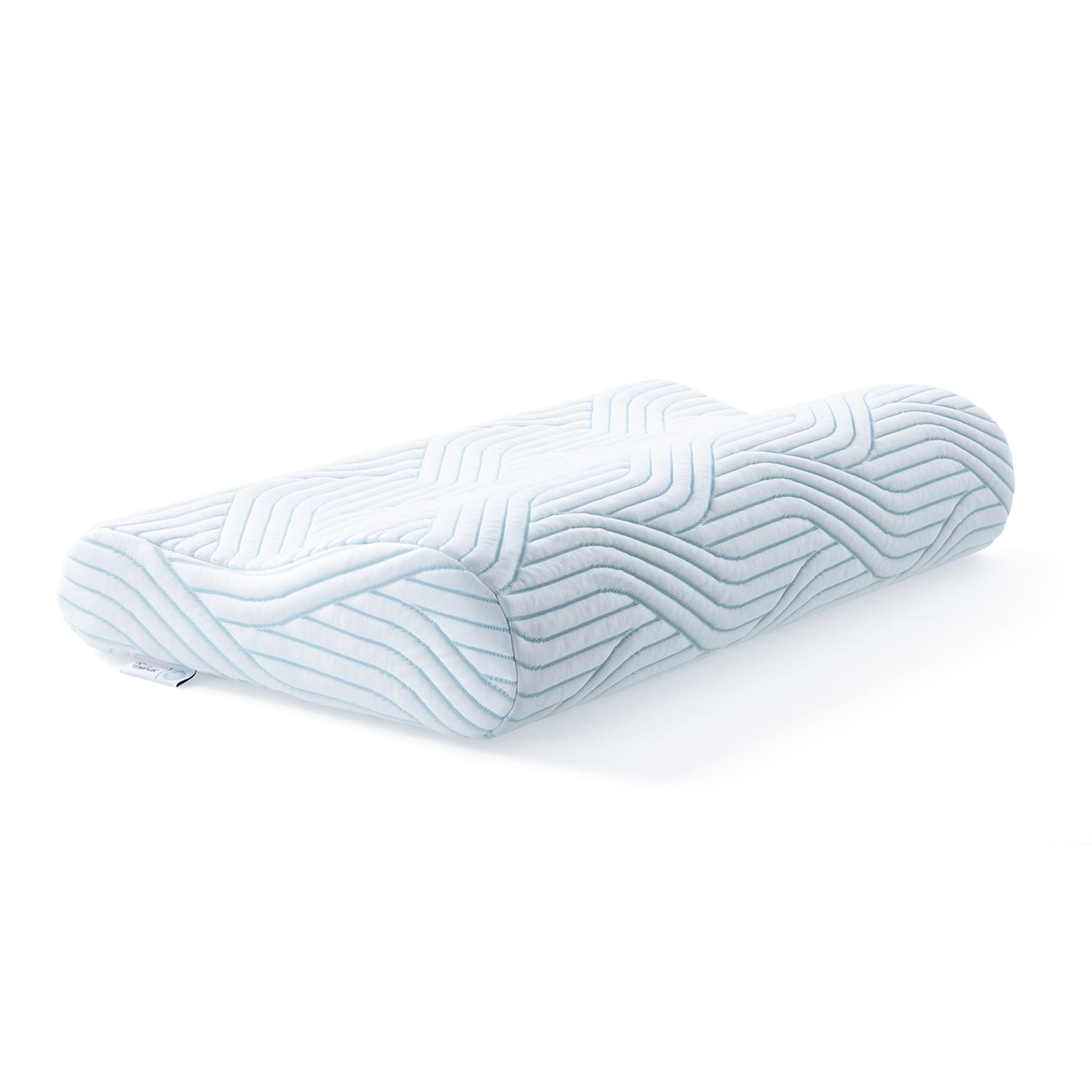 Ergonomisk pude i hvidt og lyseblåt stof med bølgemønster.