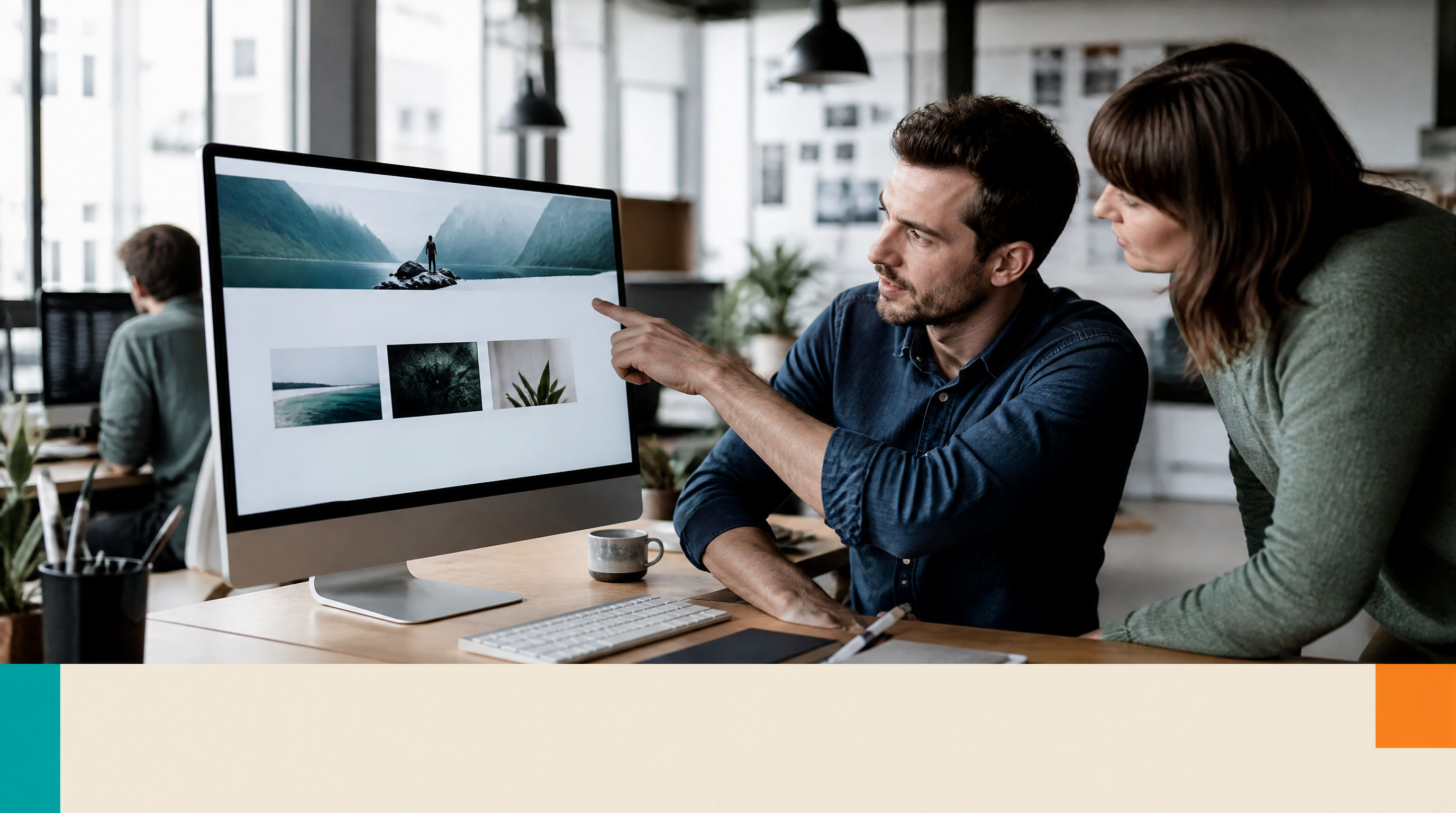 The 5 Golden Rules of a Website Every Small Business Should Follow — Supporting visual 1: A male web designer in his 30s points at a large monitor displayi