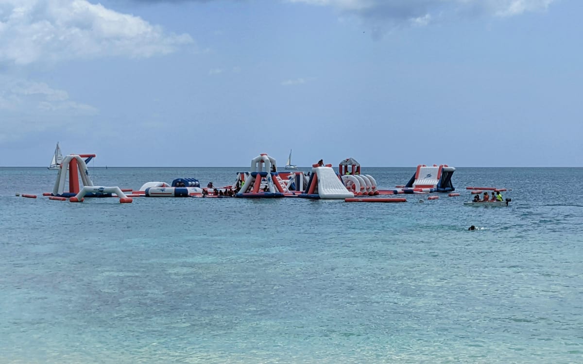 Rascals inflatable water park in the sea off Brandons Beach, Barbados.