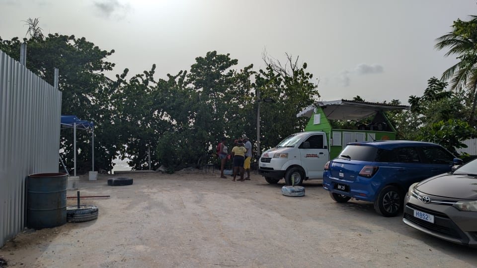 Pizza Bums and vehicles in the partially restricted Heywoods Beach parking area.