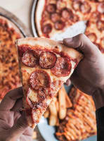 PIzza Store  - Highly Profitable Prime Location  - Booming City Edge Location