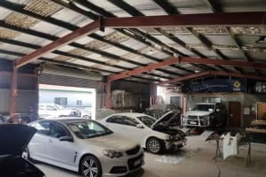 24 Hour Towing Service & Body Repair Shop