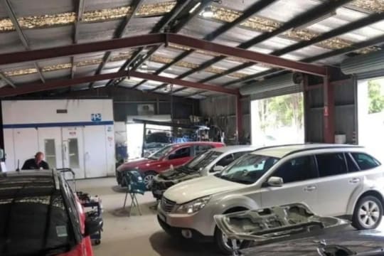 24 Hour Towing Service & Body Repair Shop