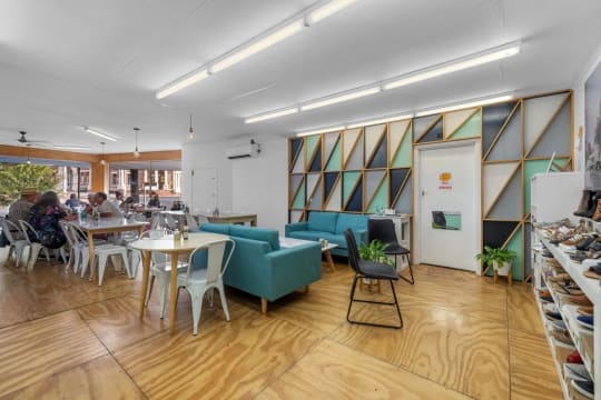 This corner cafe is big, bright and located with very high exposure.