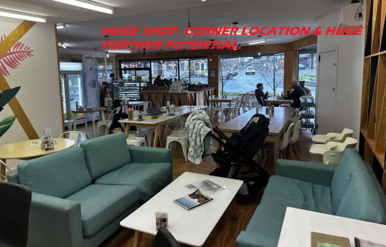 This corner cafe is big, bright and located with very high exposure.