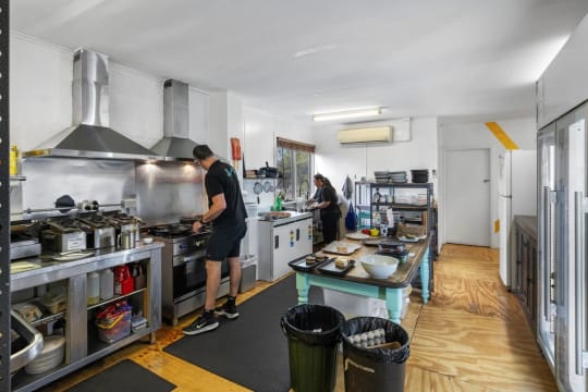 This corner cafe is big, bright and located with very high exposure.