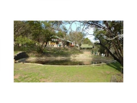 ICONIC LOG CABIN TEA HOUSE RESTAURANT WITH TOP VIEWS UNDER MT GLADSTONE LOOKOUT