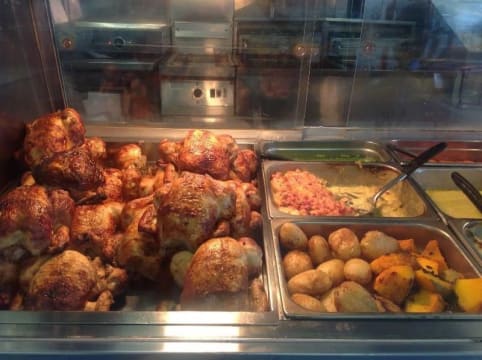 Johnos BBQ chickens salads and seafood