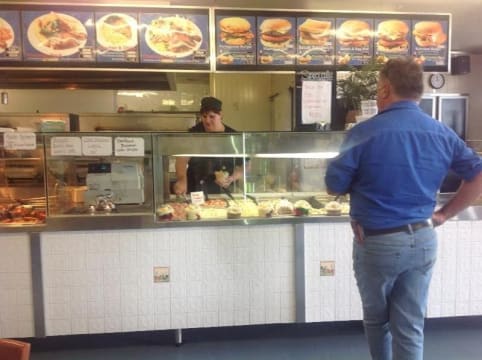 Johnos BBQ chickens salads and seafood