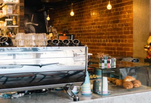 Chic Cafe in the Heart of North Melbourne – Taking $8,500 p/w. (Our Ref: V2068)