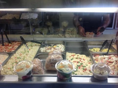 Johnos BBQ chickens salads and seafood