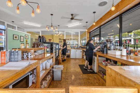 This corner cafe is big, bright and located with very high exposure.