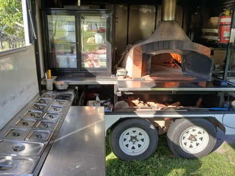 **Turnkey Mobile Wood-Fired Pizza & Catering Business Ready to Roll!**