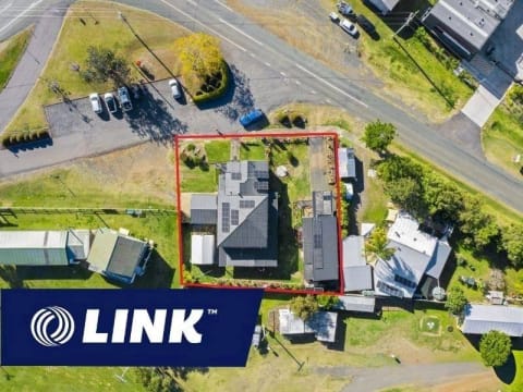 ¼ Acre with 2 Properties Prime Main Street Frontage Business