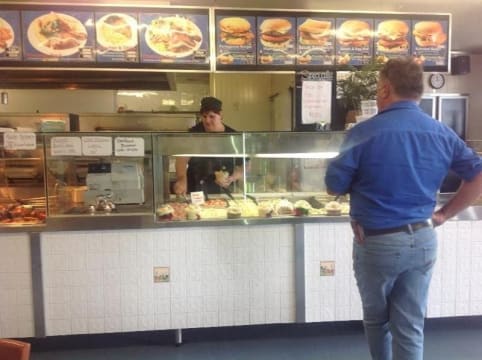 Johnos BBQ chickens salads and seafood