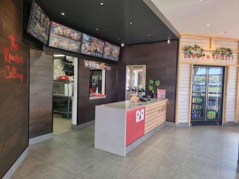 Premium Red Rooster In Gladstone Park