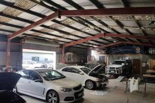 24 Hour Towing Service & Body Repair Shop