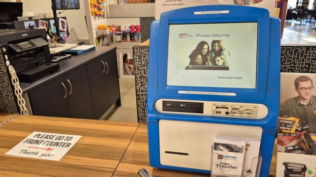 Busy Photographic shop in popular Shopping Centre