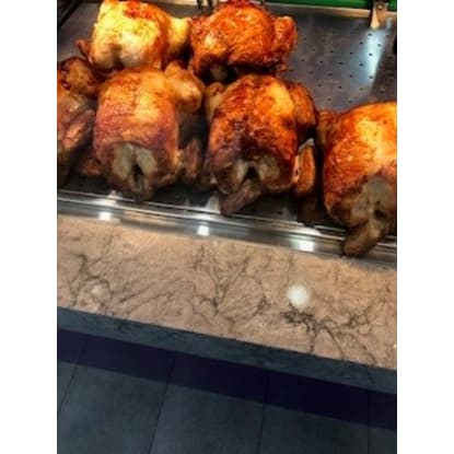 Charcoal chicken shop placed in an iconic exposed location