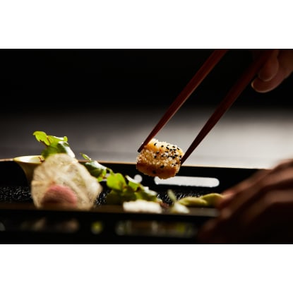 Busy Sushi train restaurant in new Commercial-Residential Complex building in Clayton