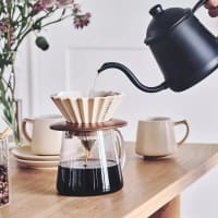 Modern Bohemian Cafe for Sale – Prime Corner Location on Bustling Main Street!