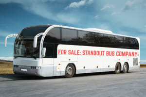 STANDOUT: 26-Bus Transport Company with Blue-Chip Clients & Freehold