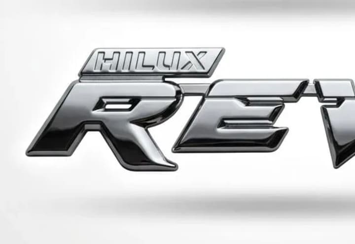 Emblema Cromado Palabra Revo und. - Car Zone Accesorios Honduras