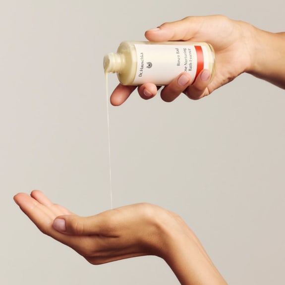 body care lotion in hand