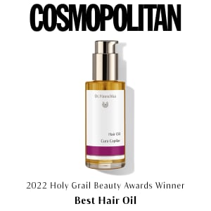 Dr. Hauschka Hair Oil bottle on white background with Cosmopolitan and 2022 Holy Grail Beauty Awards winner text.
