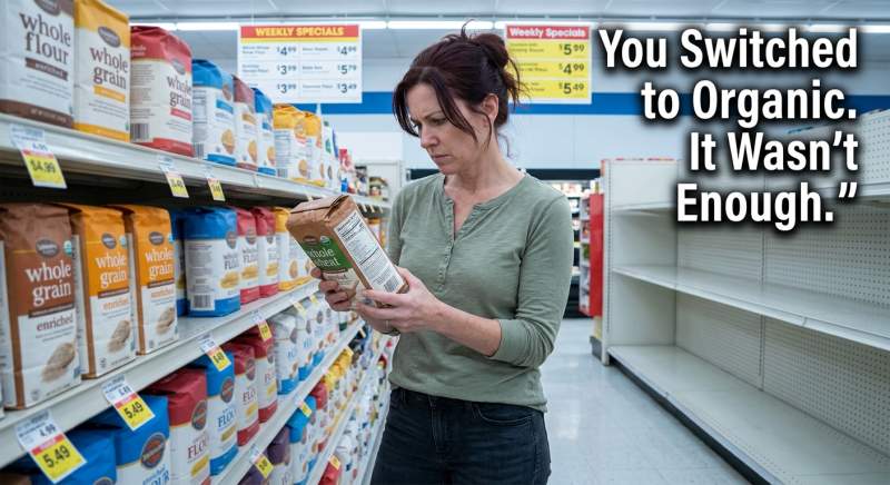 Woman reading a commercial flour bag label in a grocery store aisle, looking frustrated