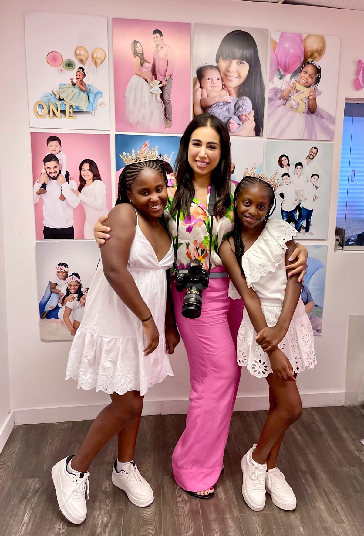 Dana with young clients at Armane Photography studio — warm community atmosphere