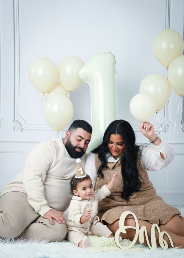 Family portrait photography session in Montreal studio — mother and children in elegant setting